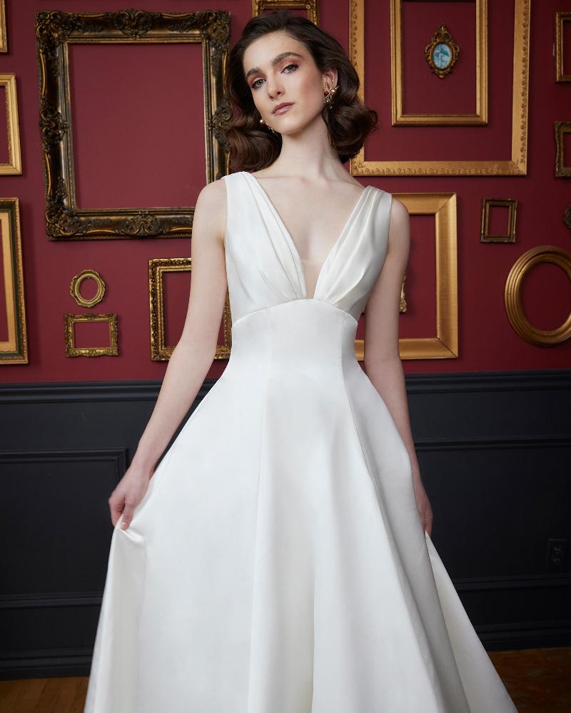 La23257 vintage cap sleeve wedding dress with pockets and ball gown silhouette3
